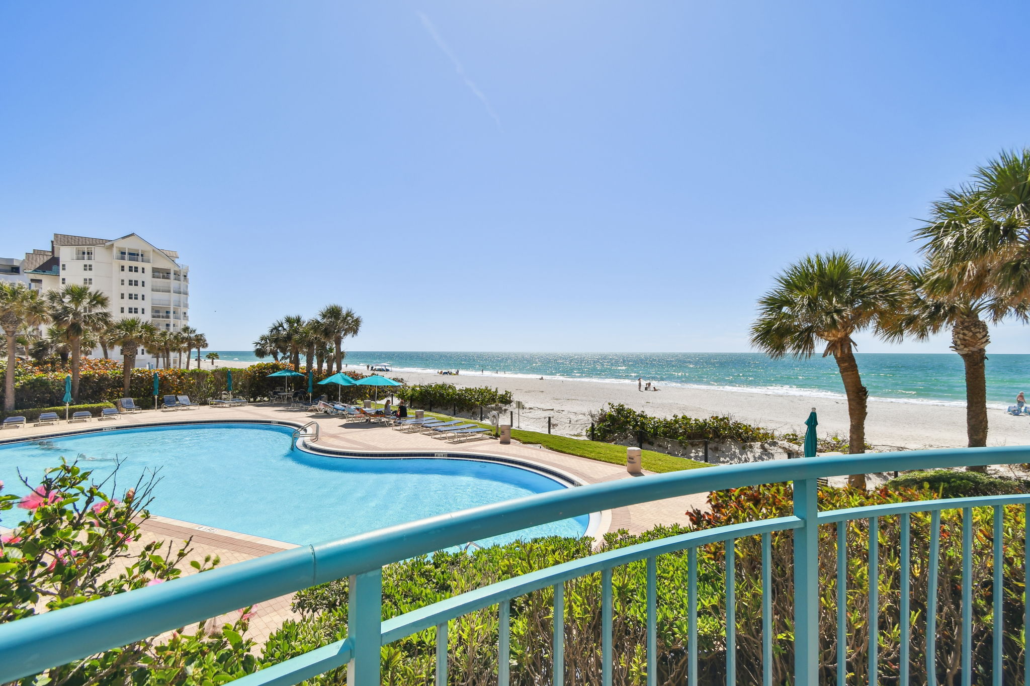 Common Area Exterior Patio Overlooking South Pool & Water Views