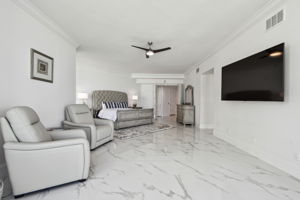 Primary Bedroom With Seating Area