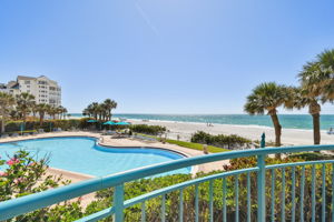 Common Area Exterior Patio Overlooking South Pool & Water Views
