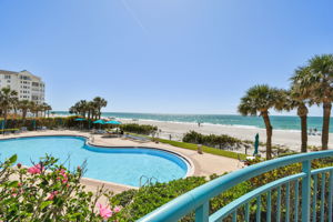 Common Area Exterior Patio Overlooking South Pool & Water Views