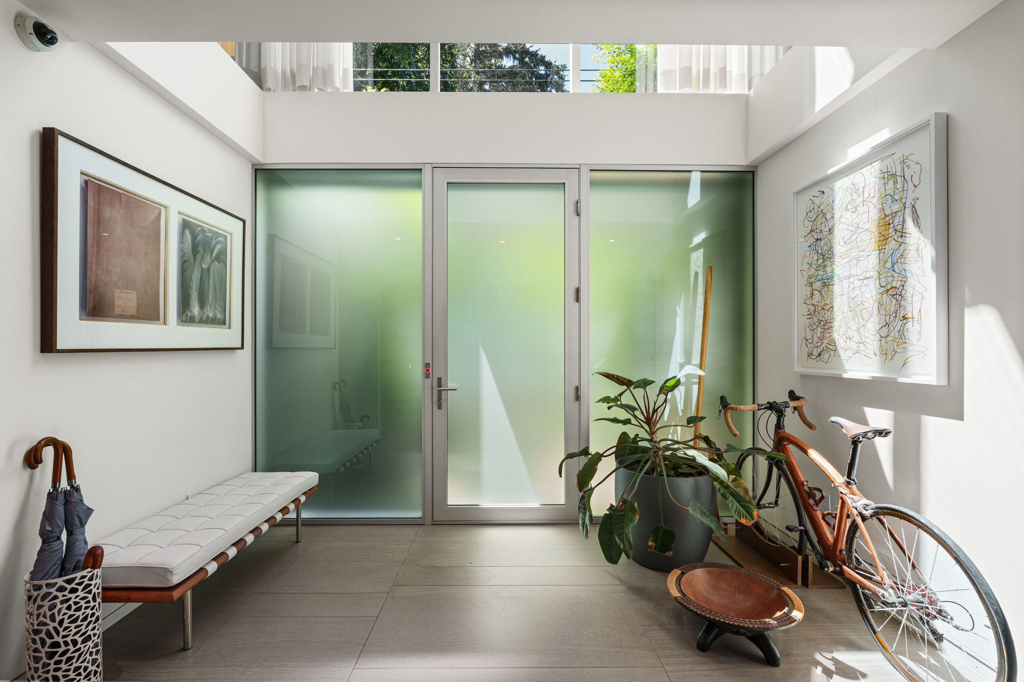 Entryway with adjacent front hall closet