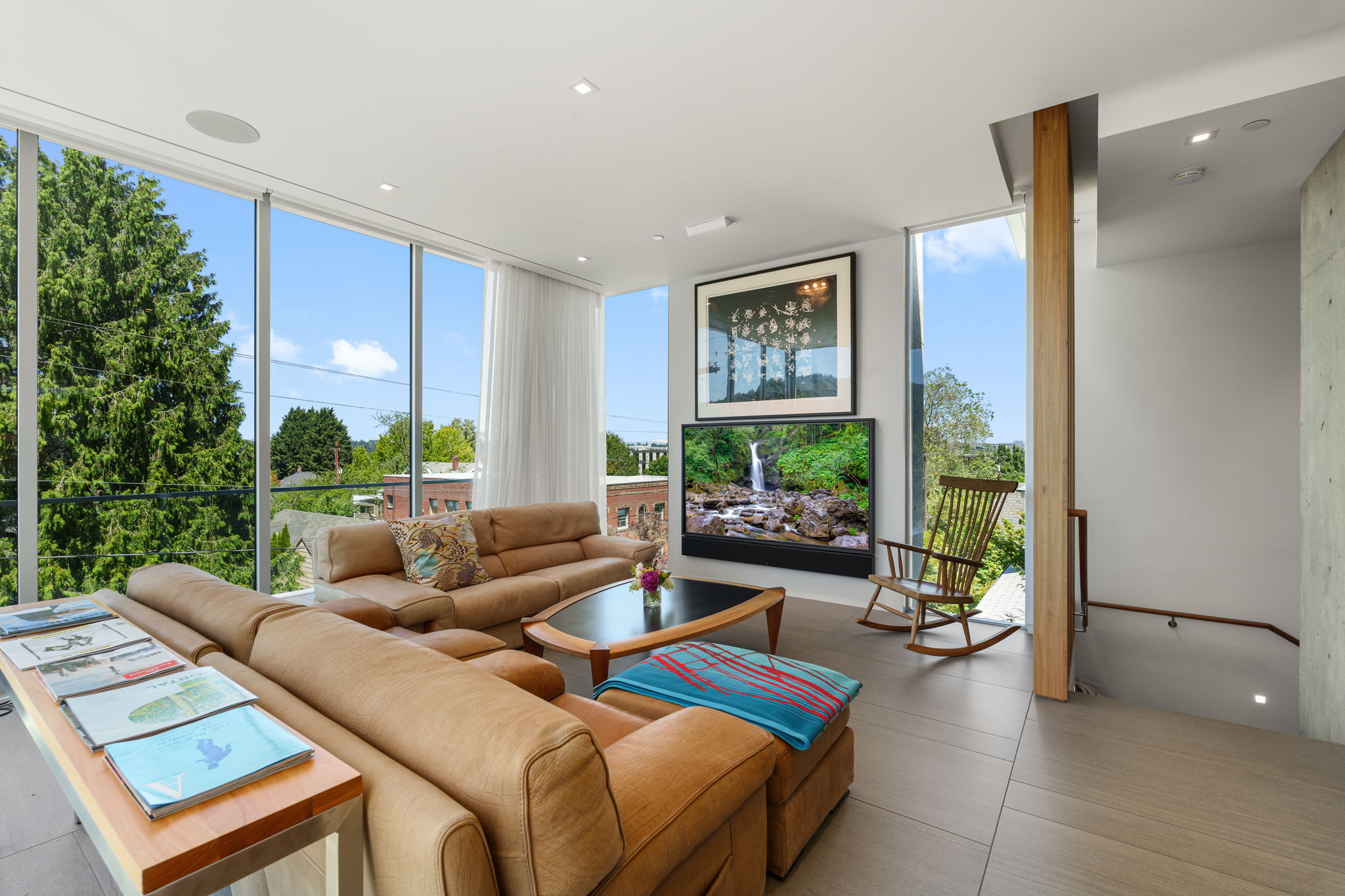 Living room with gas fireplace behind TV