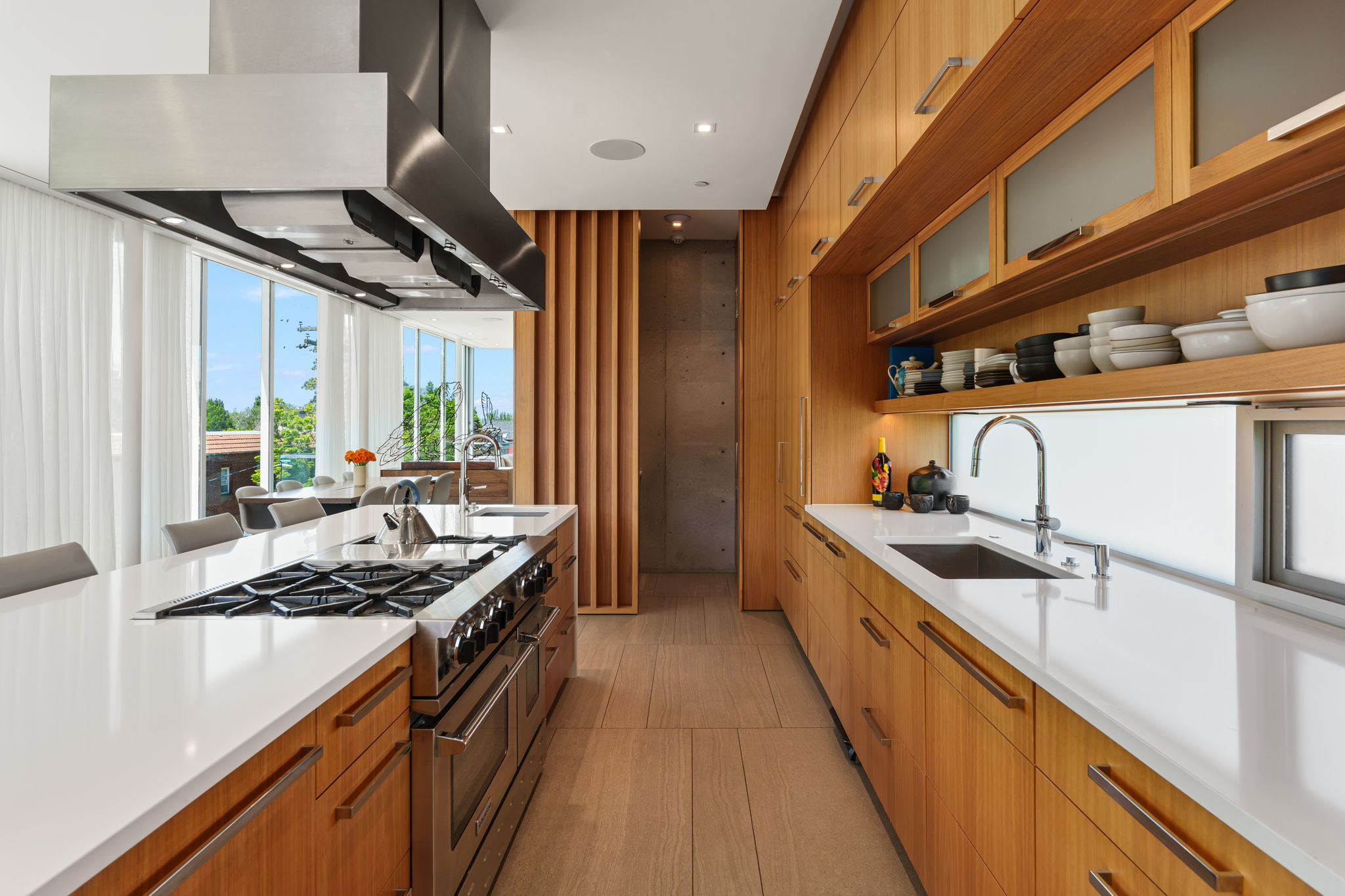 Integrated appliances, including Sub-Zero refrigerator and Miele dishwasher.