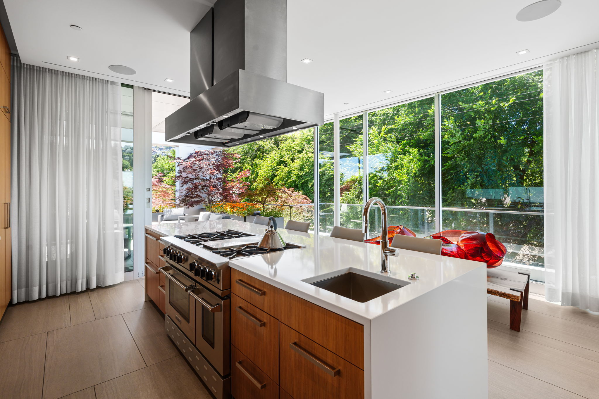 BlueStar range and convection oven. Custom-built Vent-A-Hood combines two ventilation hoods.