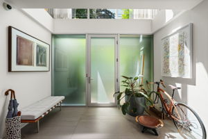 Entryway with adjacent front hall closet