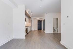 Open concept living room kitchen den