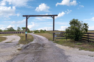 Entrance to the property with a private gate.