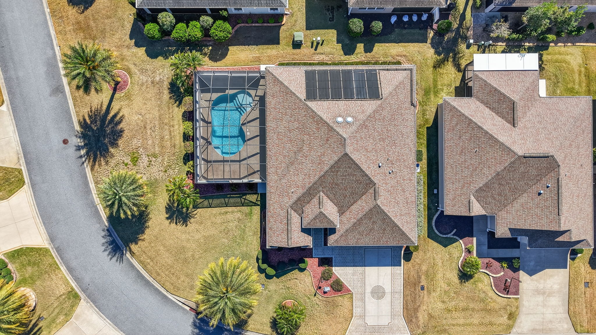 Aerial with Spacious Corner Lot and Swimming Pool