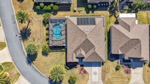 Aerial with Spacious Corner Lot and Swimming Pool