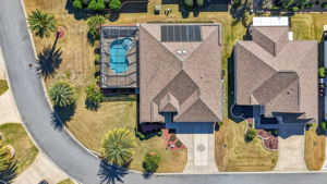 Aerial with Spacious Corner Lot and Swimming Pool