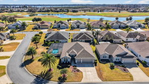 Aerial with Spacious Corner Lot and Swimming Pool