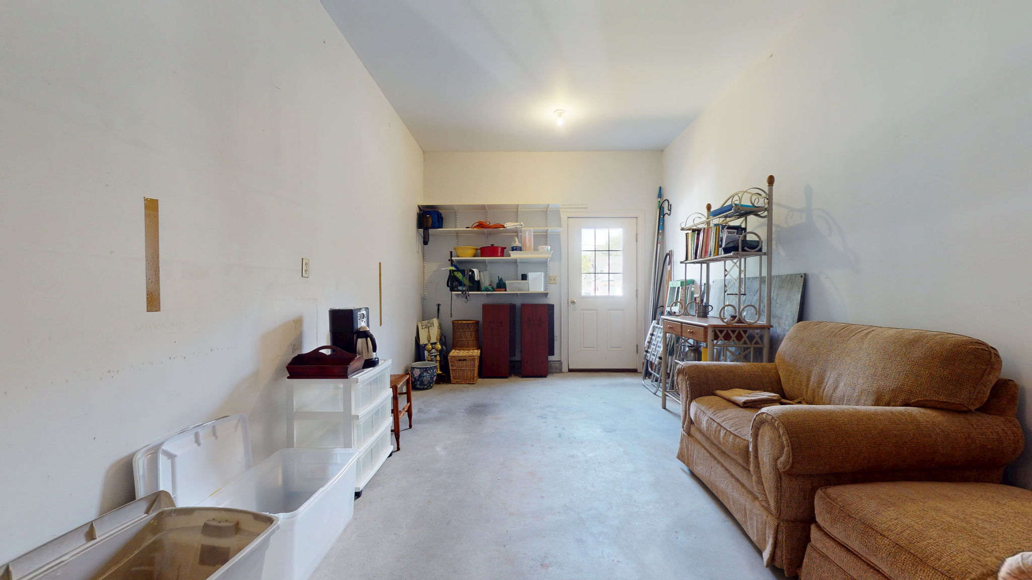 Garage with door to back yard