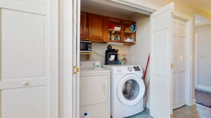 Laundry closet, and coat closet to the right