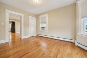 Bedroom #1 with view to Living Room and Kitchen