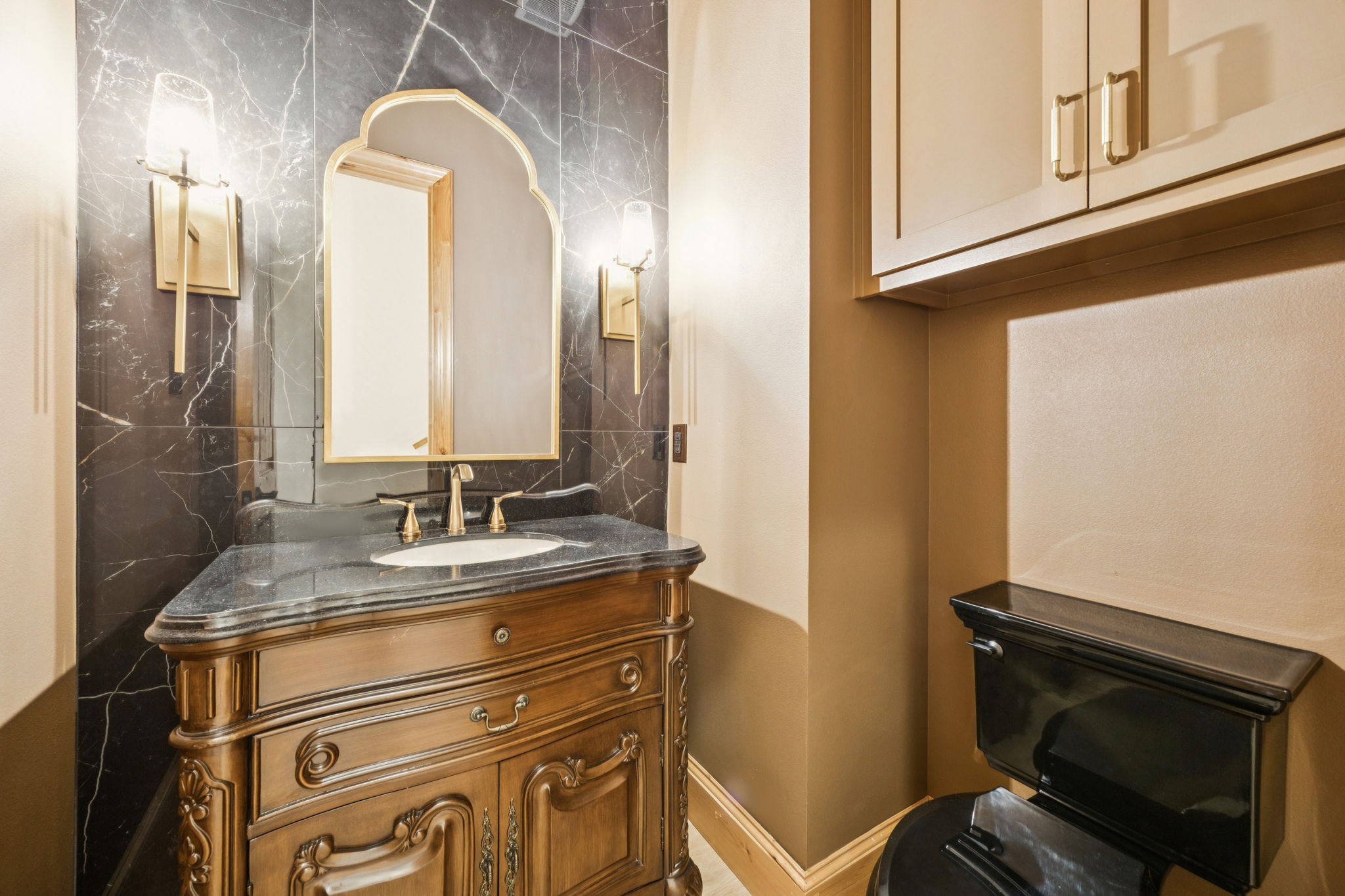 Powder With Black Marble Wall