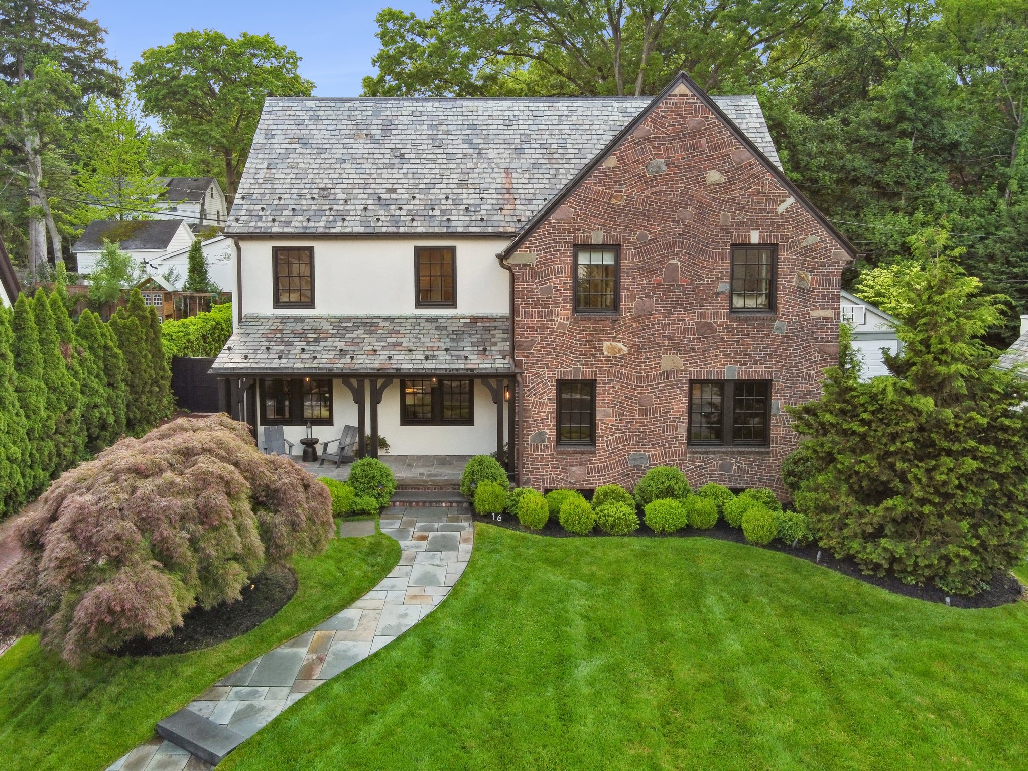 The front gable wall is a great example of 1920s "Brick Expressionism."