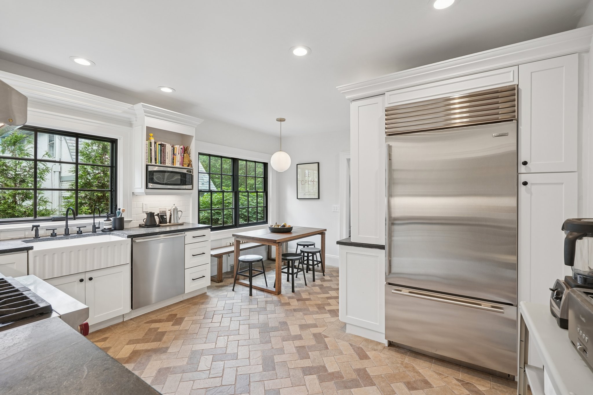 A chef's kitchen with plenty of room to keep the cook company!
