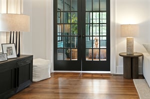 French doors to the den/office offer privacy when you need it, connected when you don’t. Say "hi" to Charlie!