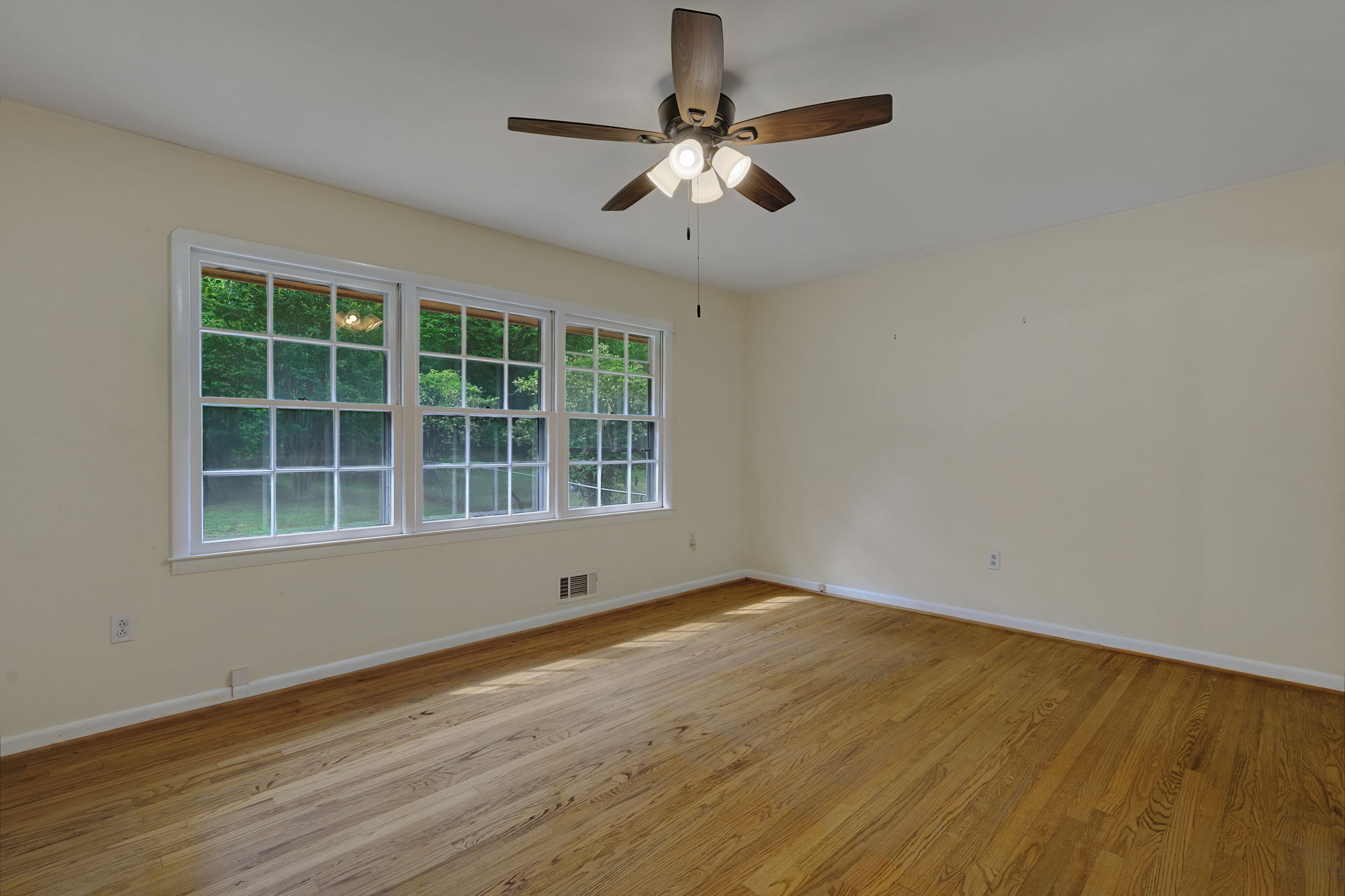 Primary Bedroom with Hardwood Floors