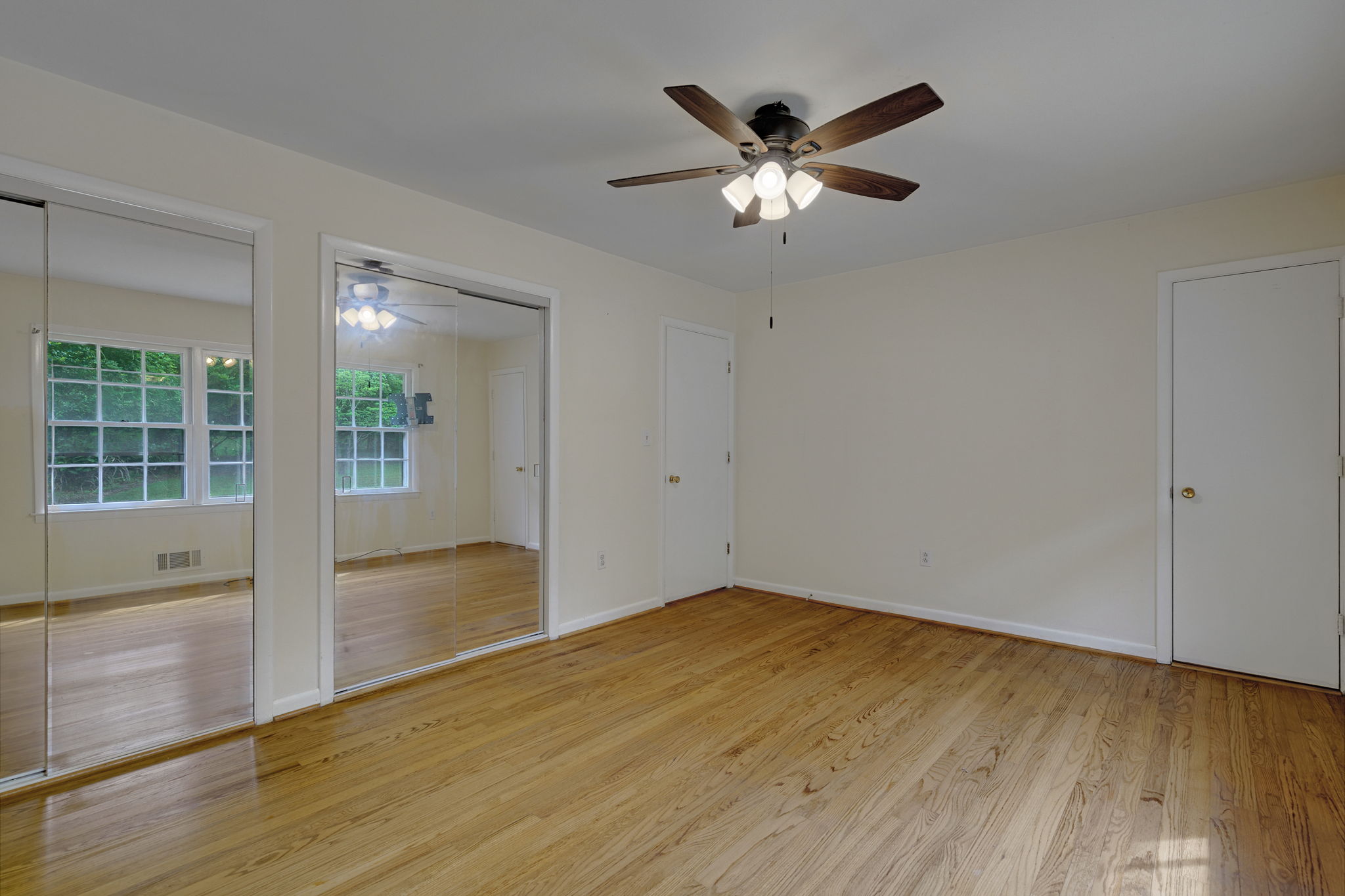 Primary Bedroom with Dual Closets