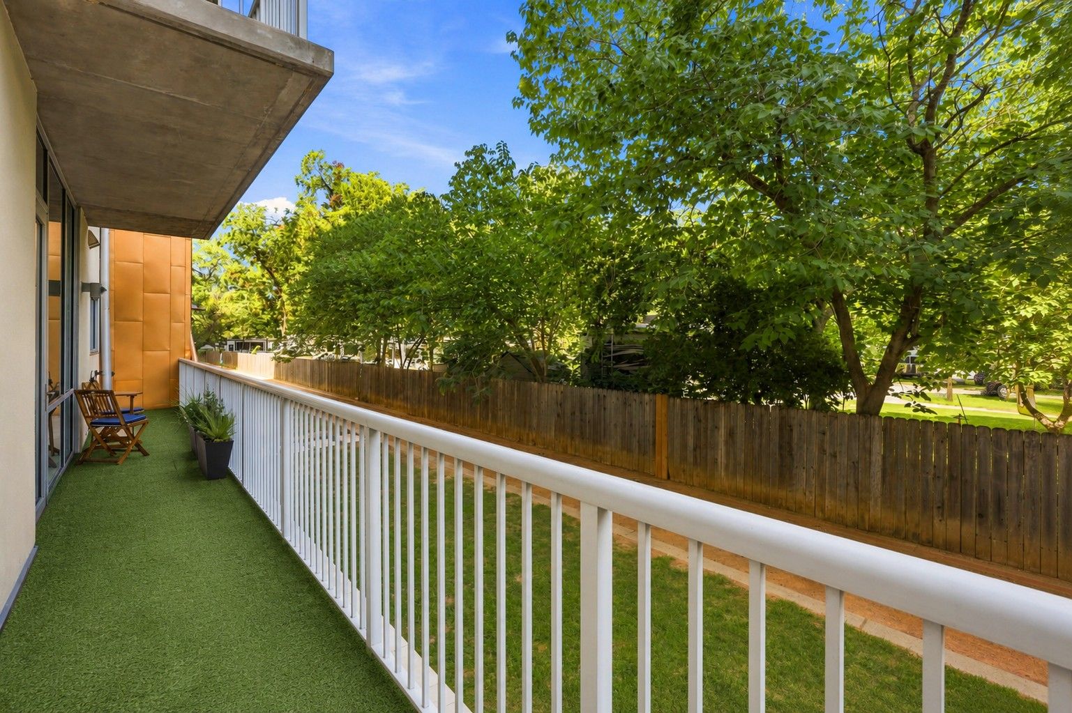 Private Terrace - showing possibility of turf for pets (AI).