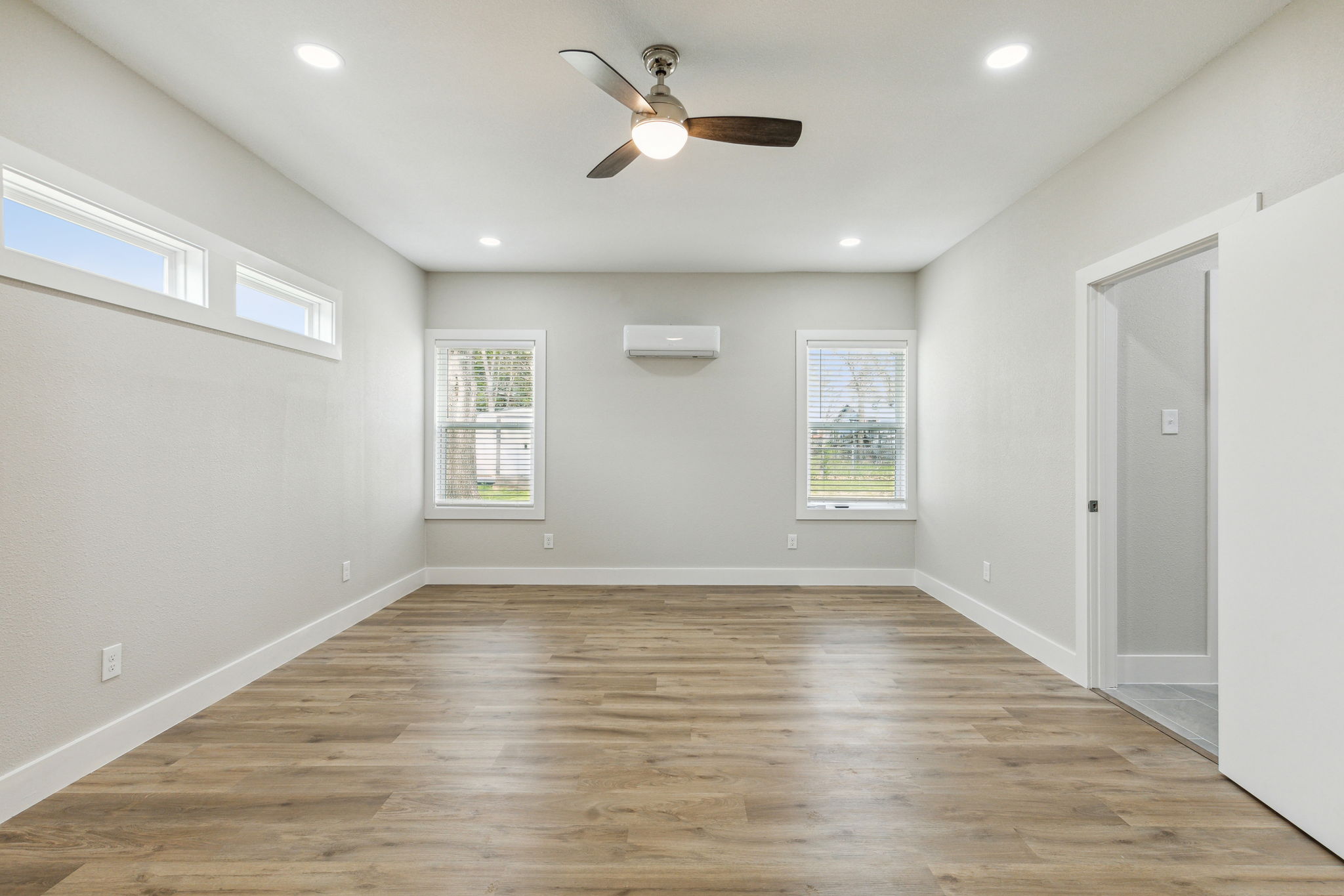 Large split primary bedroom with separate heating and cooling
