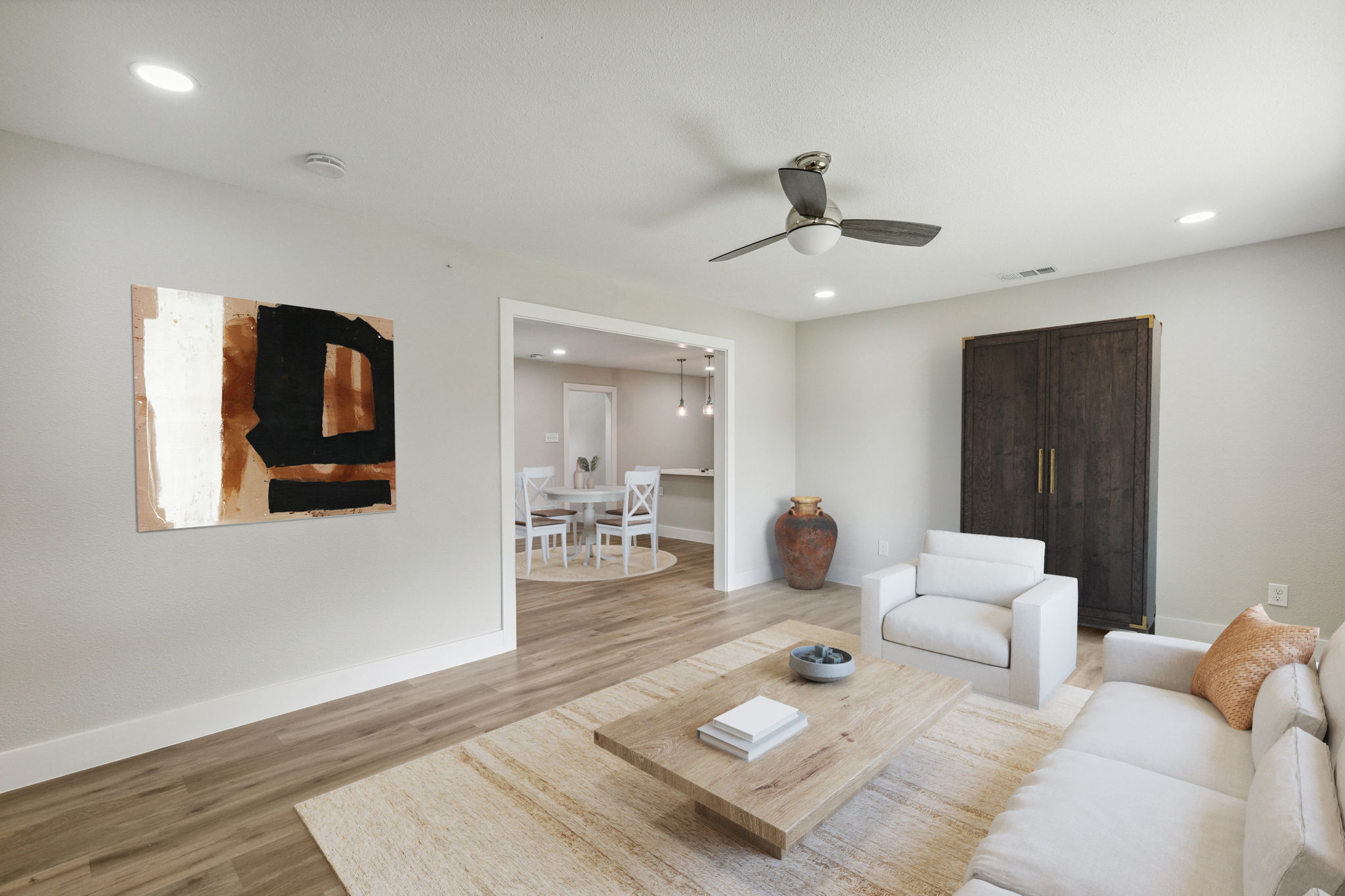 Spacious living area open to dining and kitchen areas.