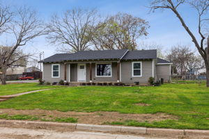 Large corner lot and a nice porch perfect for a swing or rockers!