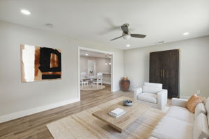 Spacious living area open to dining and kitchen areas.