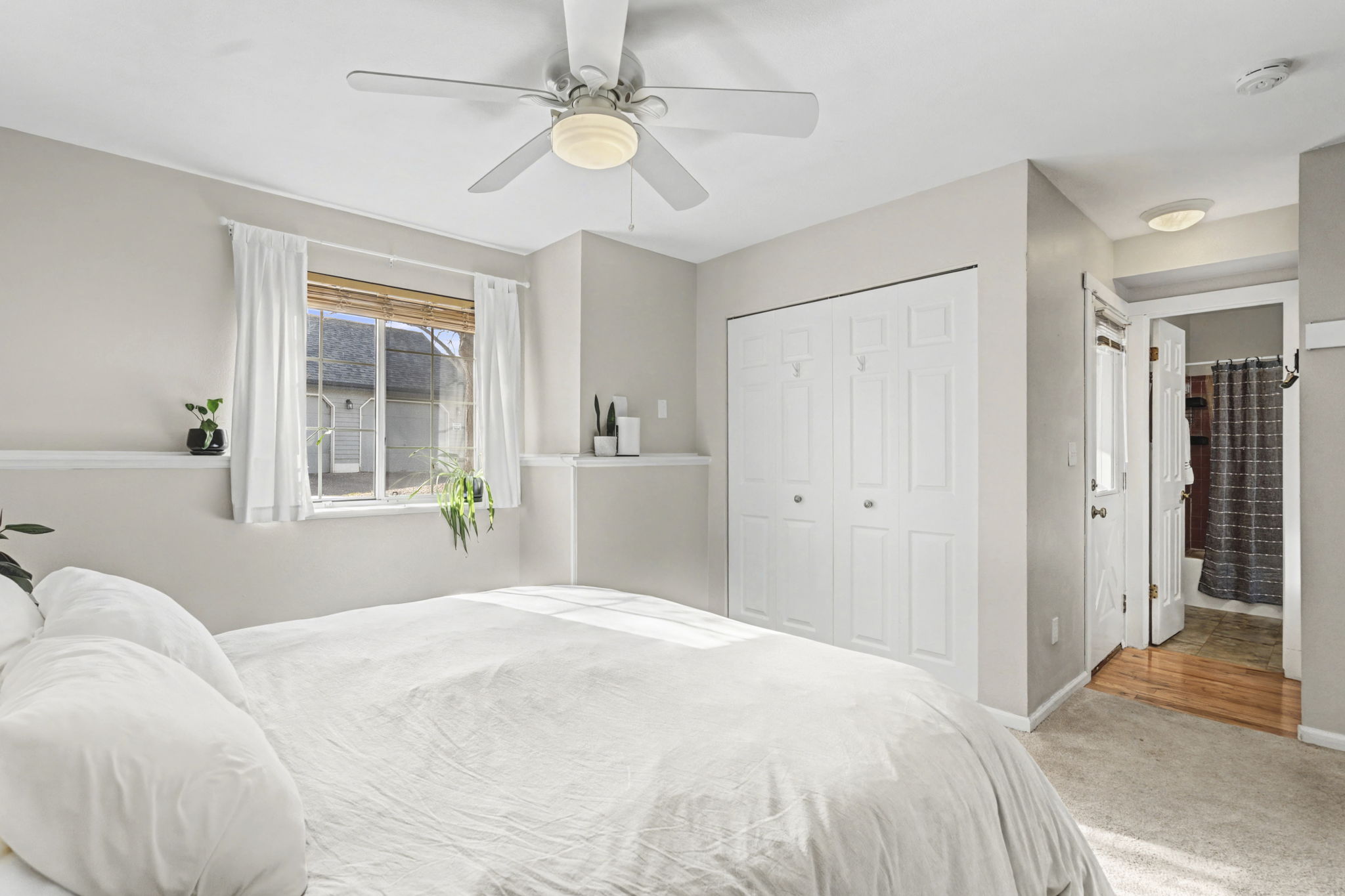 Primary Bedroom with ensuite and back patio access