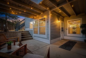 Inviting entryway area and covered front patio. What a vibe!