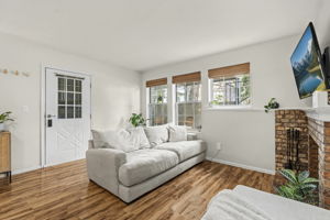 Front windows overlook the front patio