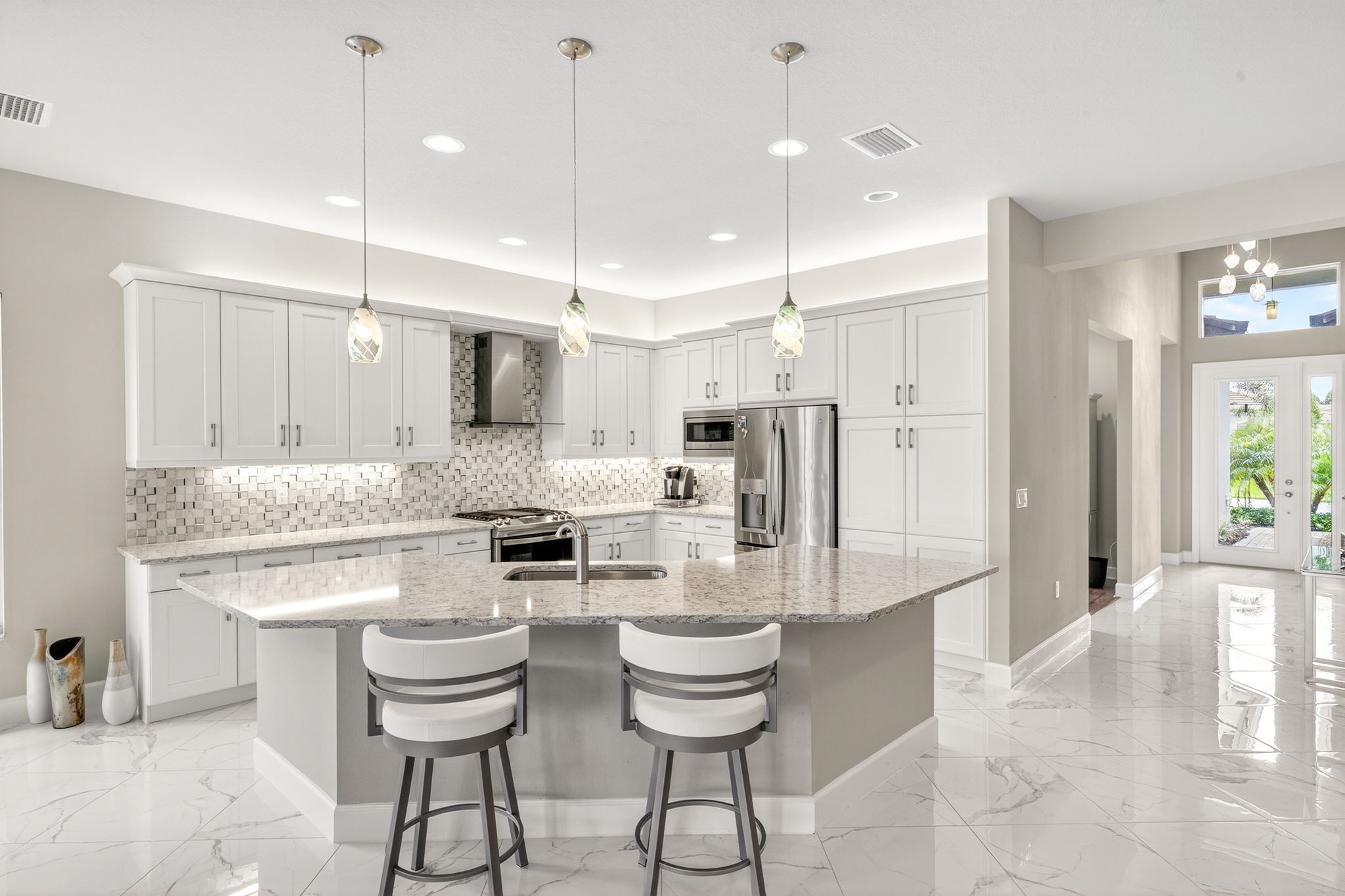 Bar seating for 4-6, pendant lighting.  All very tasteful.