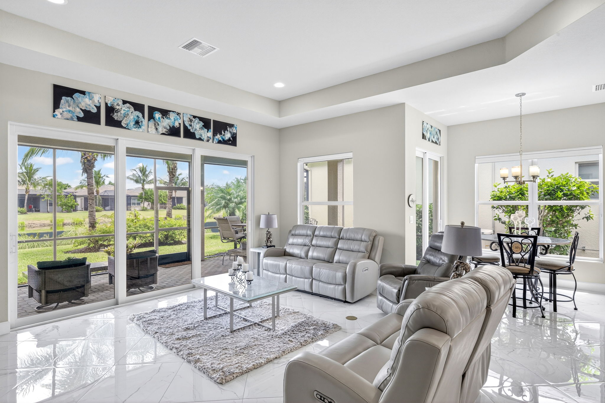 Living room with breakfast area perfect for a high top dining table.