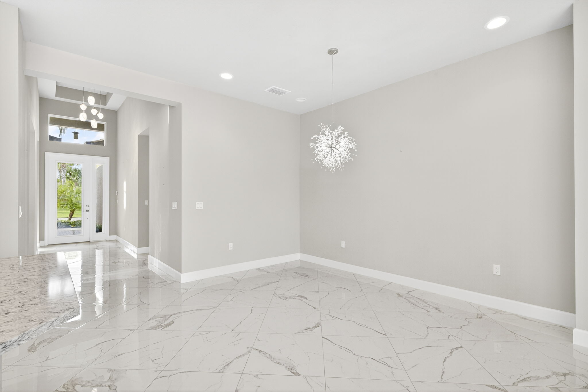 Dining space is large enough to hold a table that seats 8...