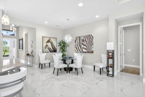 Dining space is large enough to hold a table that seats 8...