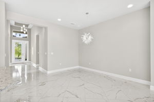 Dining space is large enough to hold a table that seats 8...