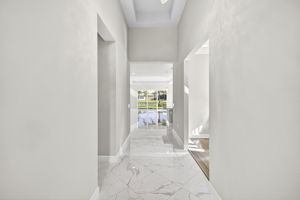 Front foyer entry looking into main living area and Lani with lake view.