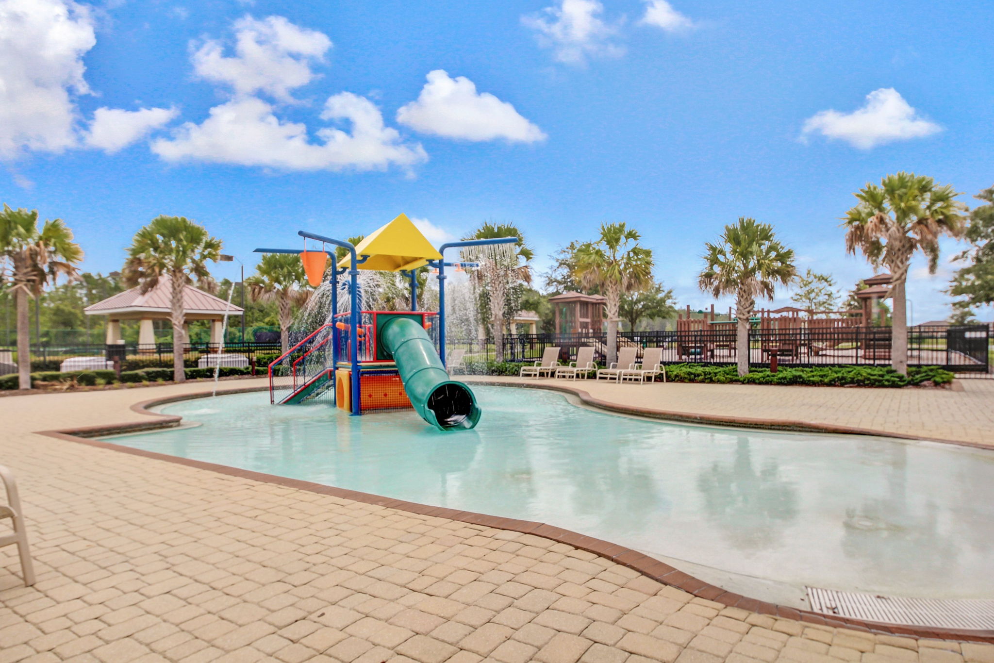 Watch your kids play in the children's splash pool.