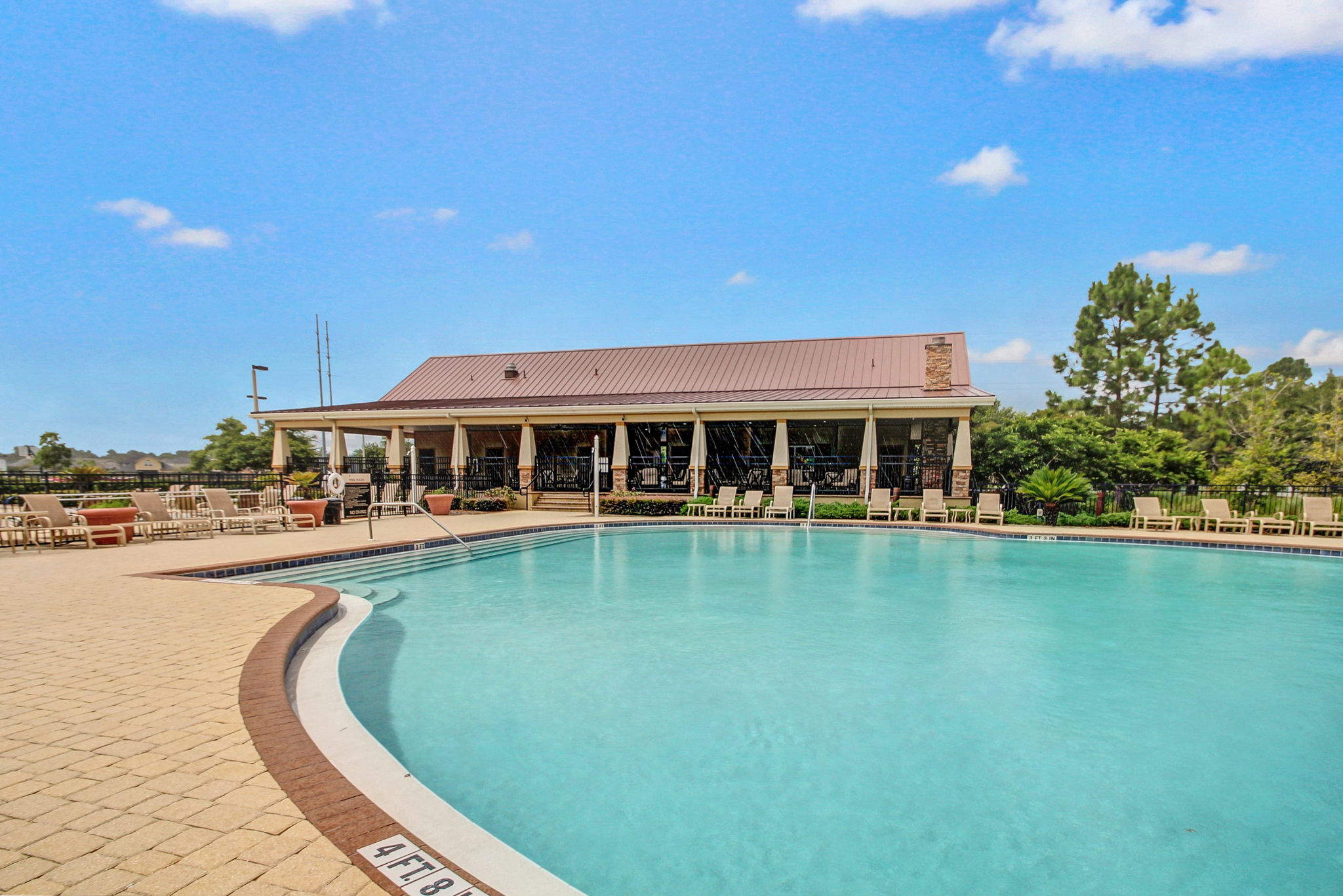 Enjoy the large resort-style pool and cabana