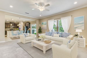Open concept living from kitchen to dining to grand gathering room