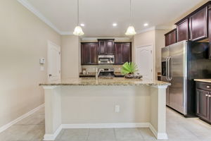 Gourmet kitchen offers ample storage and counter space