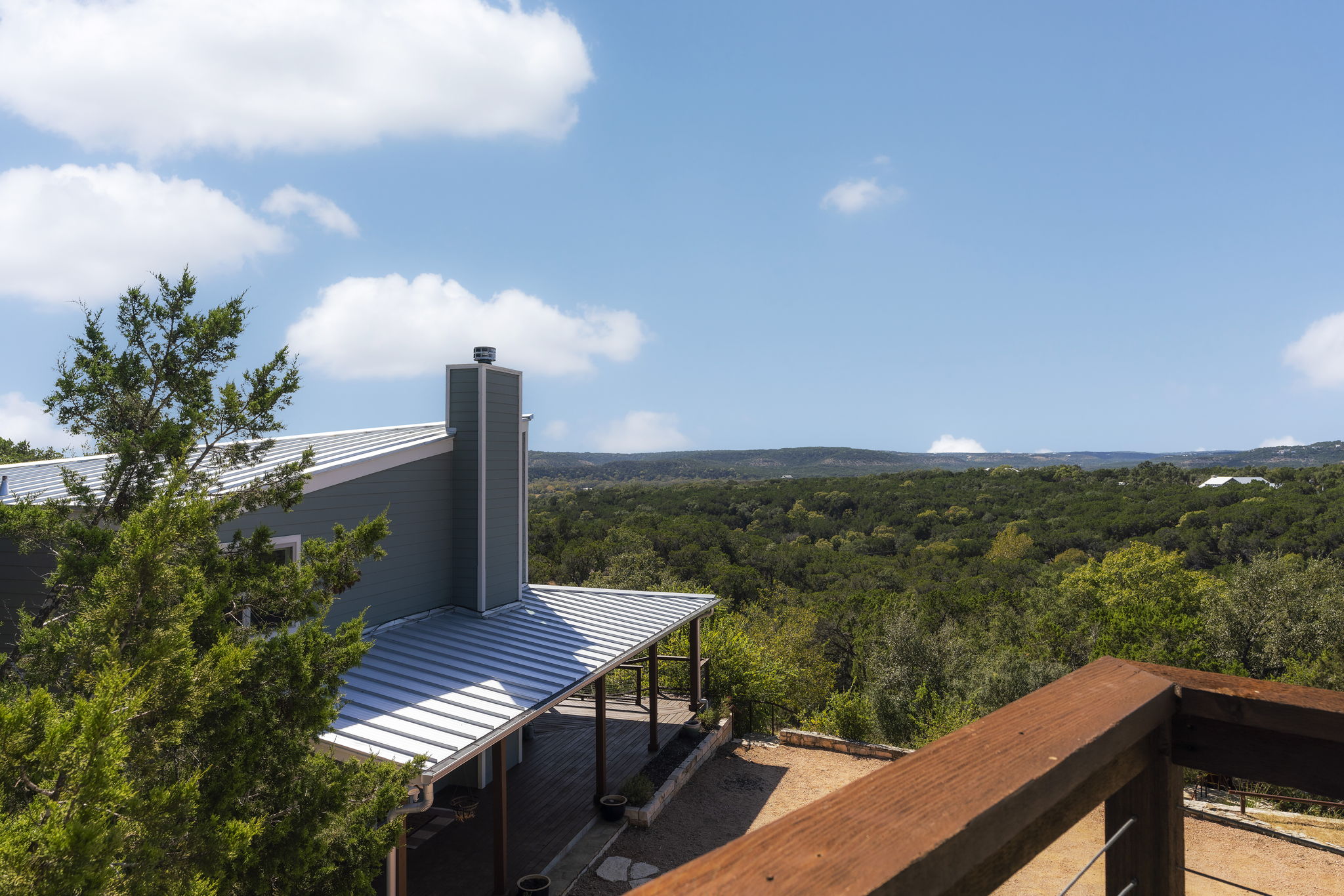 The front deck of this 2-bedroom, 1-bath fully furnished unit offers breathtaking views of the surrounding landscape.