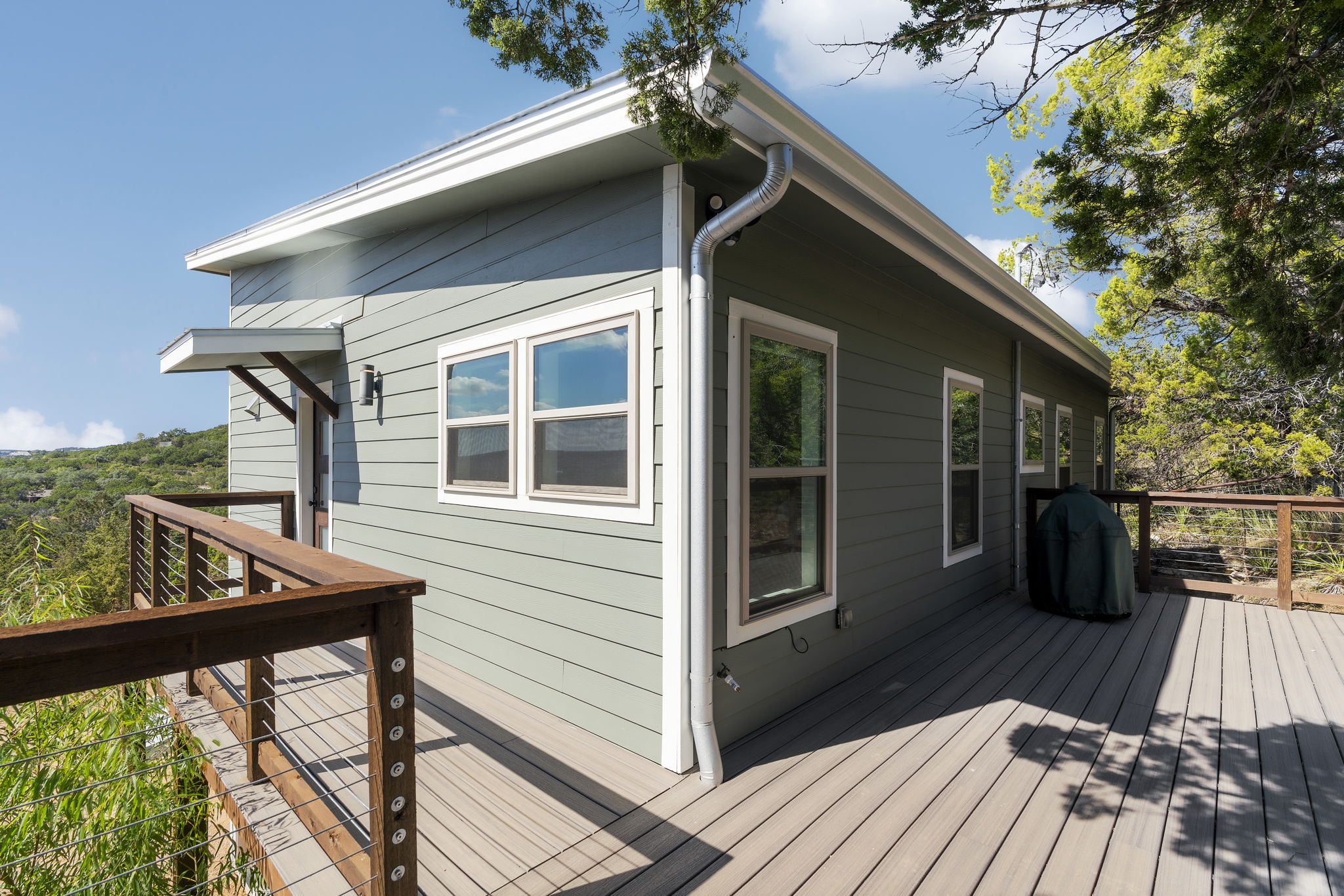 The walk up to the front door of the unit offers stunning views of the Wimberley Valley, making you feel as if you're nestled among the trees.