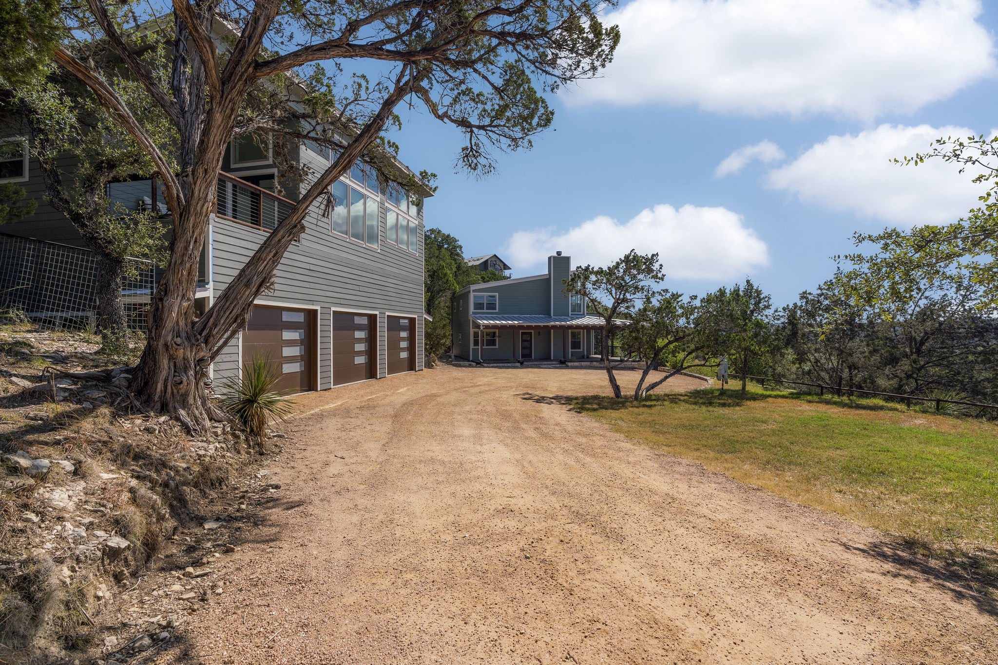 This 2-bedroom, 1-bath fully furnished unit features a second-floor entrance with floor-to-ceiling windows that showcase stunning views of the Wimberley Valley. Please note, the 3-car garage is reserved for owner storage and is not available for tenant use.