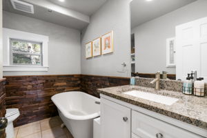 Another bathroom with a clawfoot tub downstairs