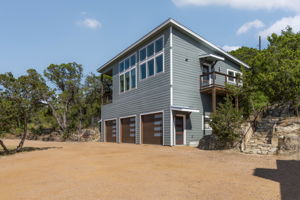 This 2-bedroom, 1-bath fully furnished unit features a second-floor entrance with floor-to-ceiling windows that showcase stunning views of the Wimberley Valley. Please note, the 3-car garage is reserved for owner storage and is not available for tenant use.