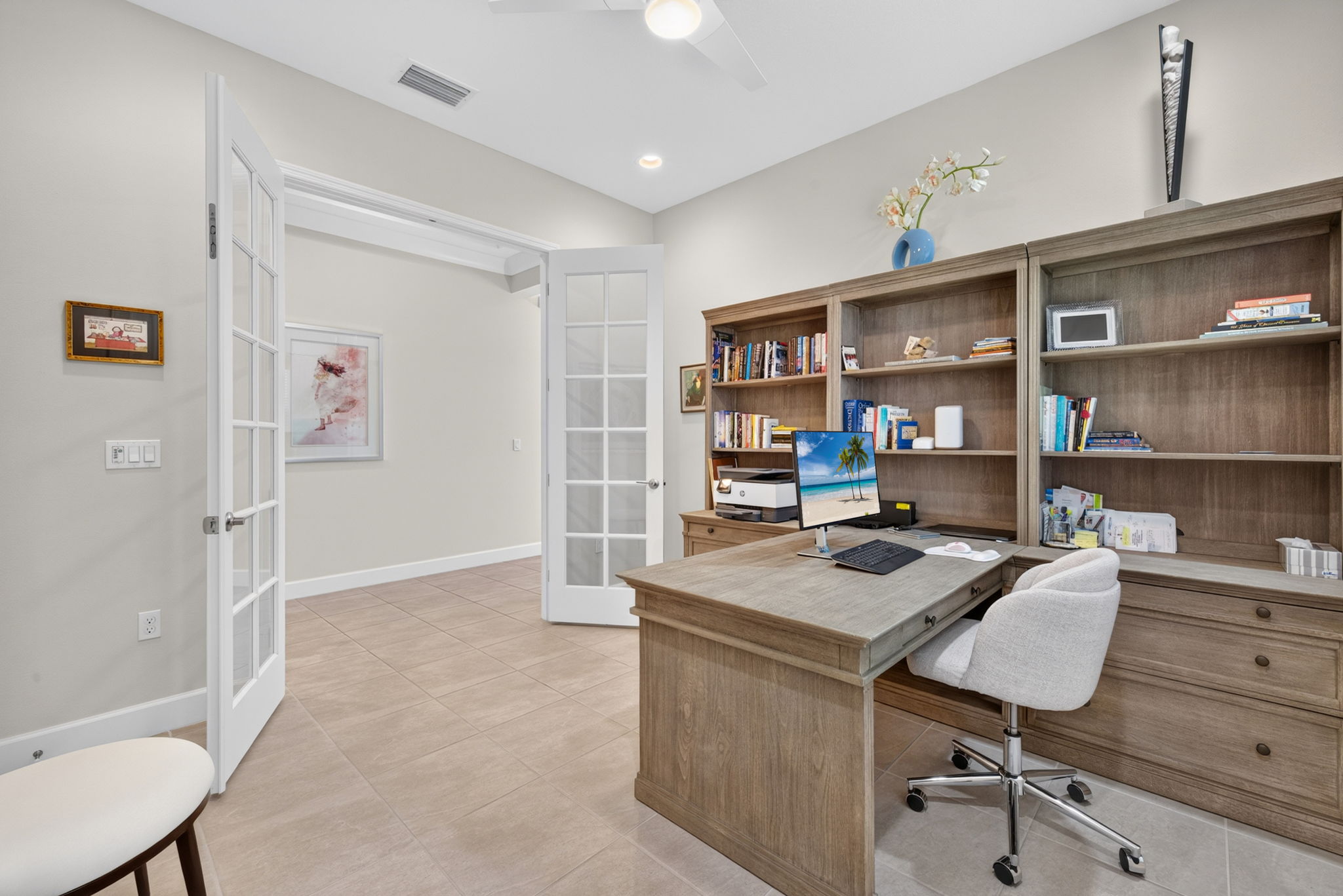 Note the art deco French doors! This 3rd bedroom is located in the middle of the home.