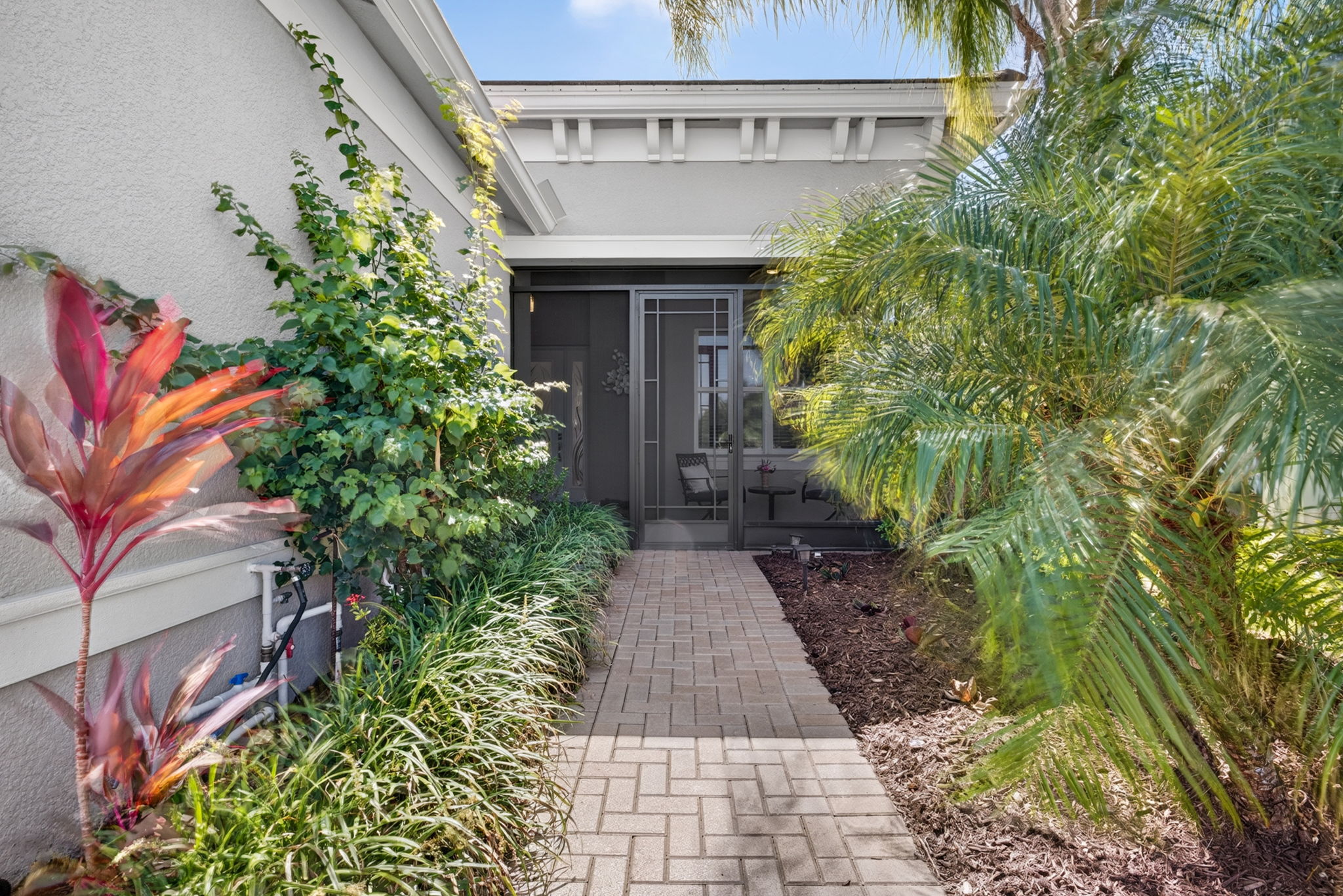 Beautiful landscaping leads you to your new home!
