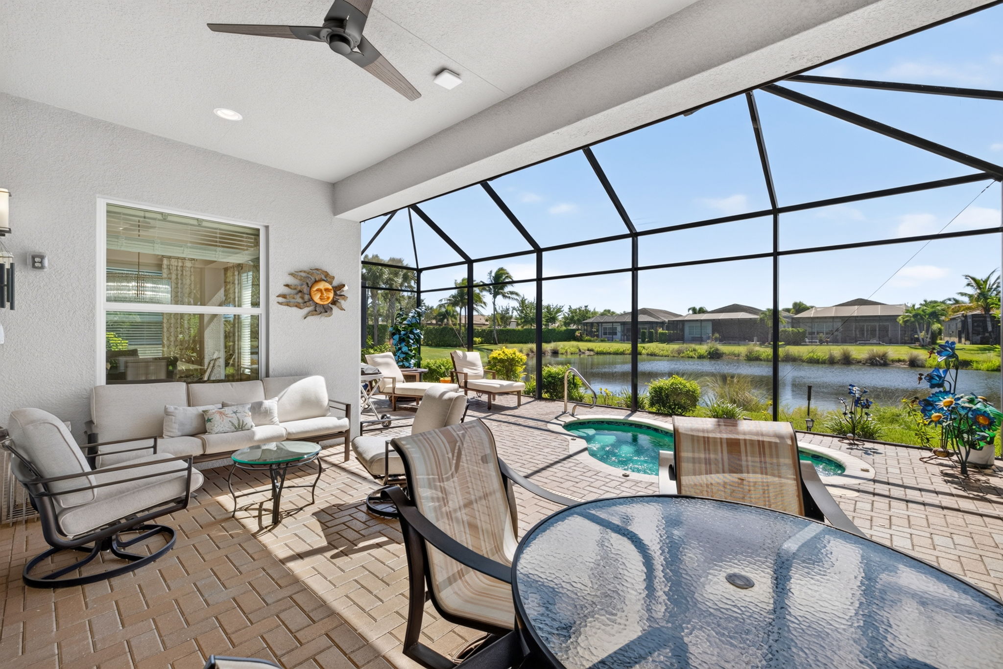 Here in SWFL, outdoor space expands your living space year round! Room for eating, relaxing or soaking up the sun here! Outdoor furniture conveys!